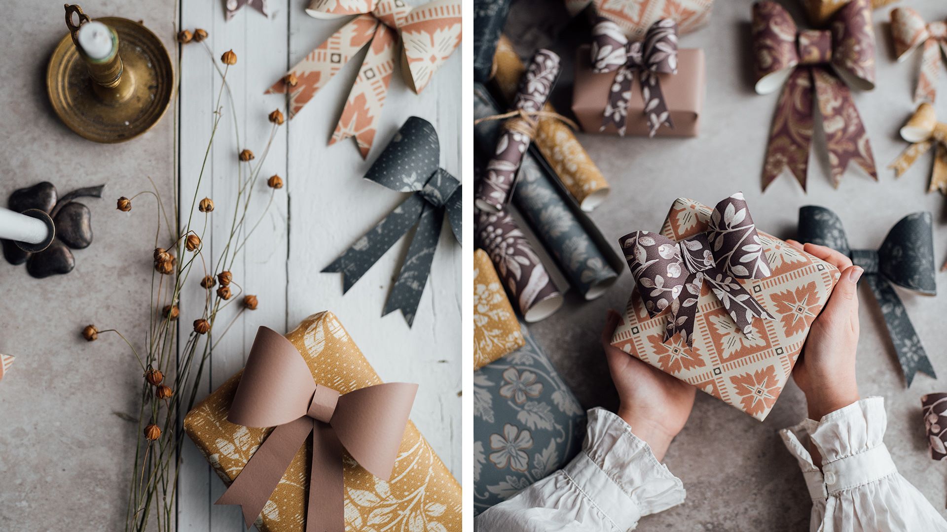 Dekorerade julklappar med färgglada rosetter och mönstrat papper, samt torkade växter och ett stearinljus på ett bord