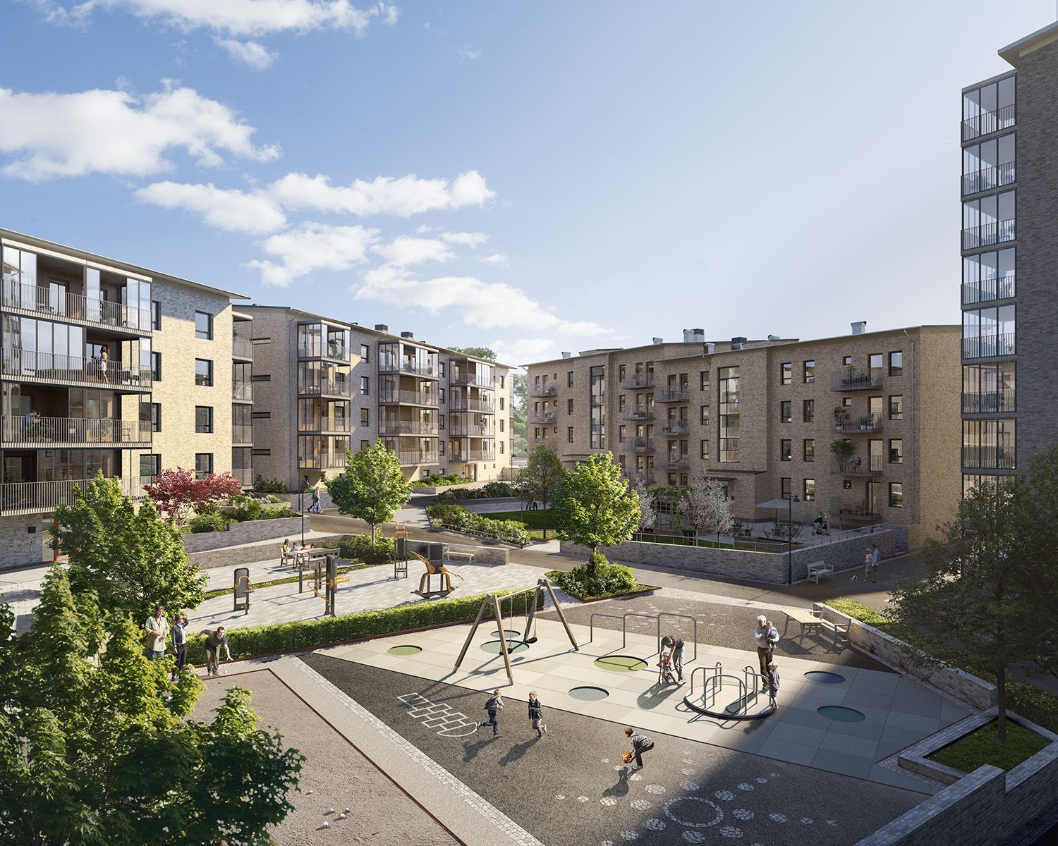 Modern bostadsområde med flervåningshus, lekplats och grönytor under klarblå himmel