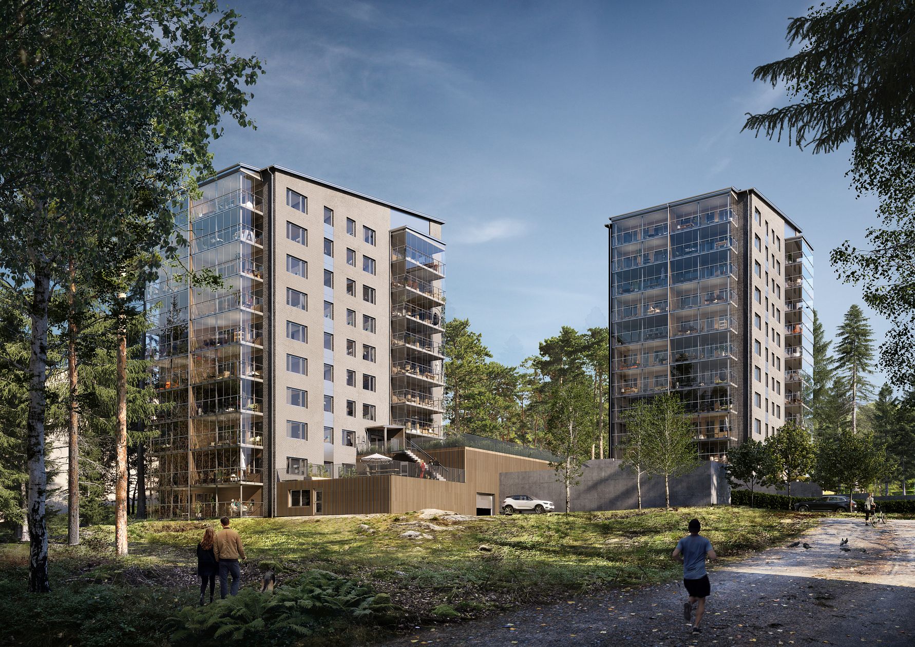 Två moderna flerfamiljshus med glasfasader omgivna av träd och grönska, med personer som promenerar och joggar i förgrunden
