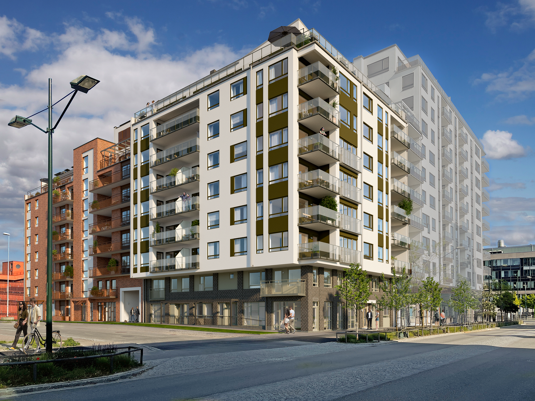 Flerfamiljshus med modern arkitektur, balkonger och stora fönster, omgivna av en stadspark och trottoarer under en klarblå himmel