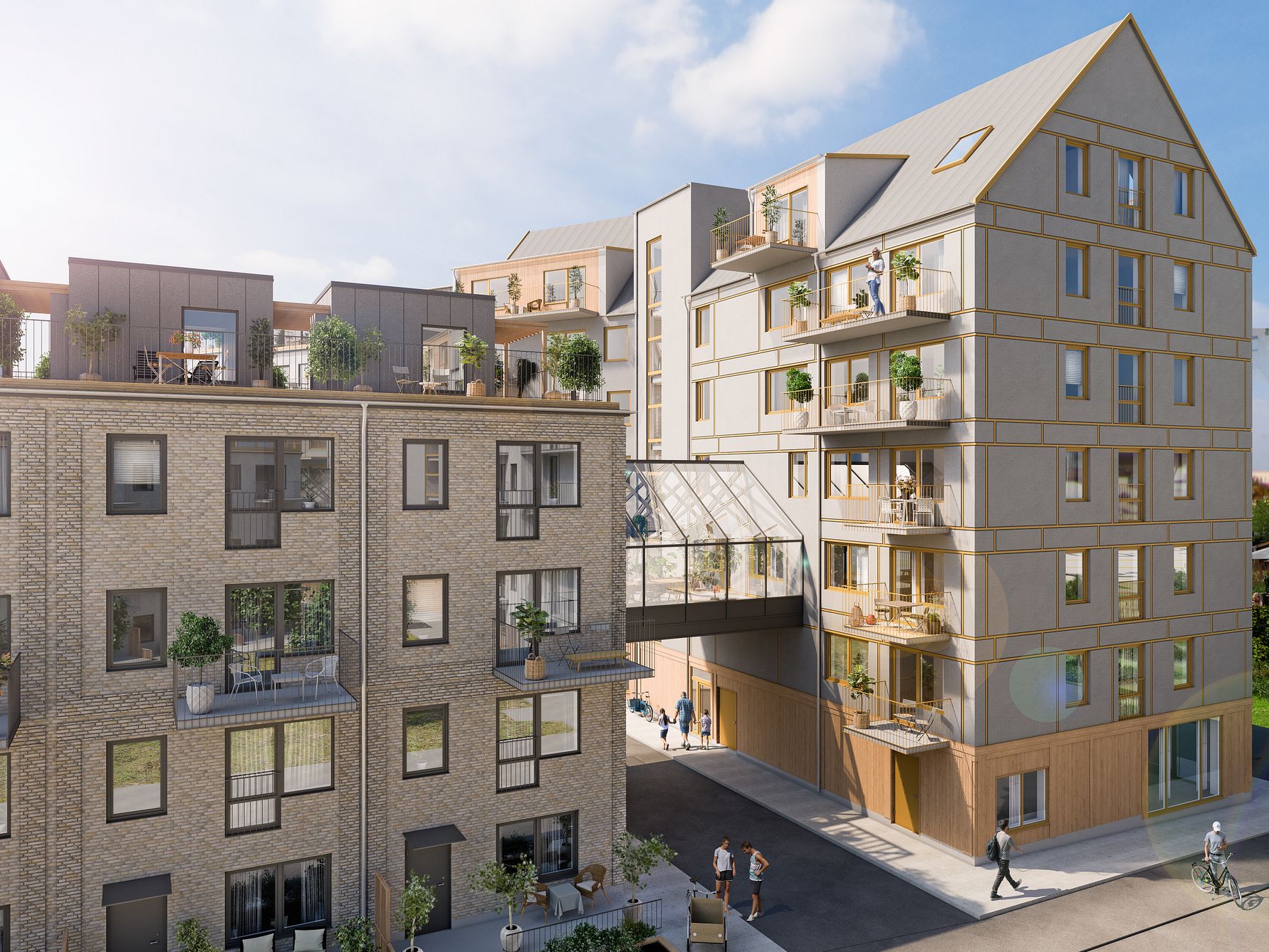 Flera flerfamiljshus med moderna fasader, stora fönster och balkonger, förbundna med en glasbro