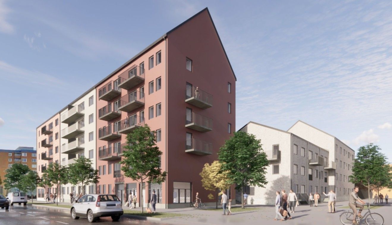 Byggnadskomplex med moderna flerfamiljshus i varierande färger, omgivna av träd, människor och bilar på en solig dag