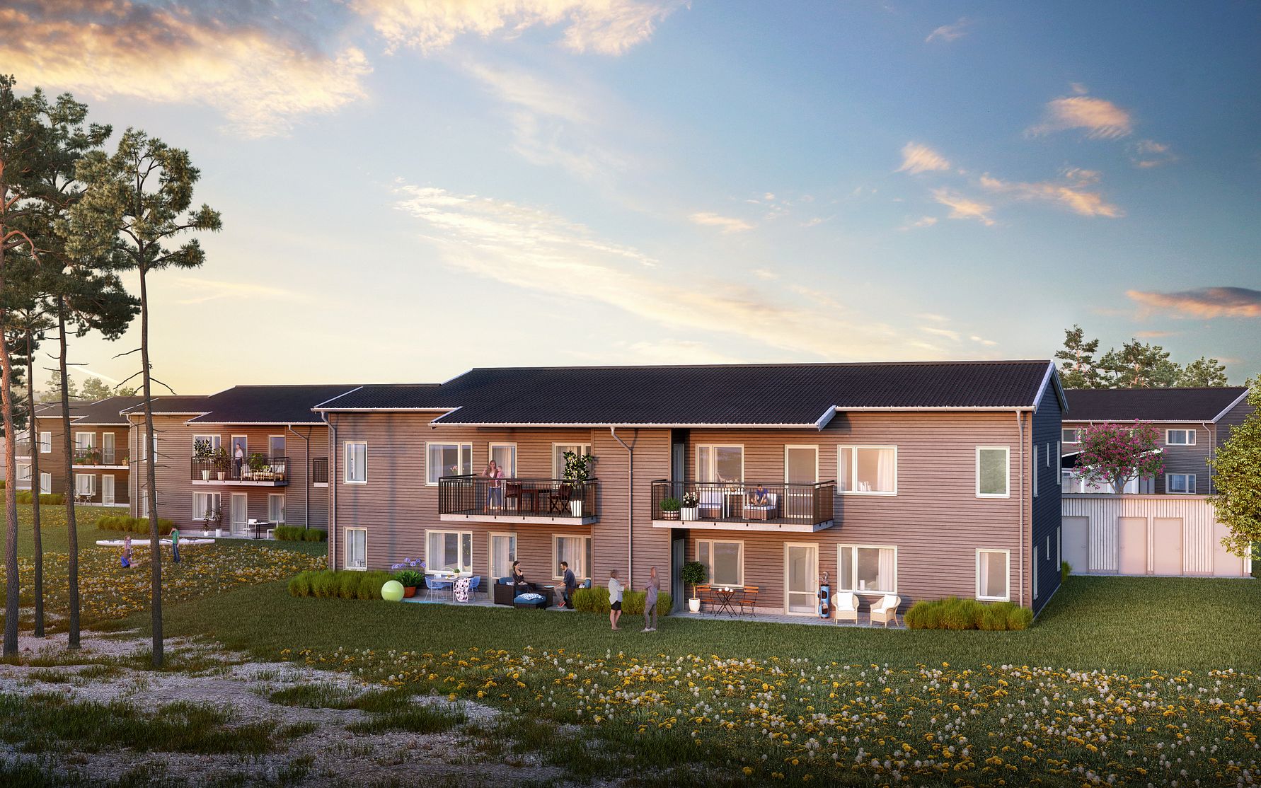 En modern bostadsbyggnad med två våningar, omgiven av grönskande natur, blommor och träd under en klar himmel