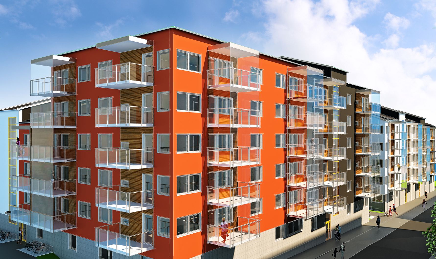 Flerbostadshus med färgglada fasader i rött, orange och beige, med glasade balkonger och moderna arkitektoniska detaljer