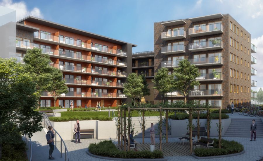 Flerfamiljshus med modern arkitektur, omgivna av grönska och en öppen gårdsplan med pergola och sittplatser