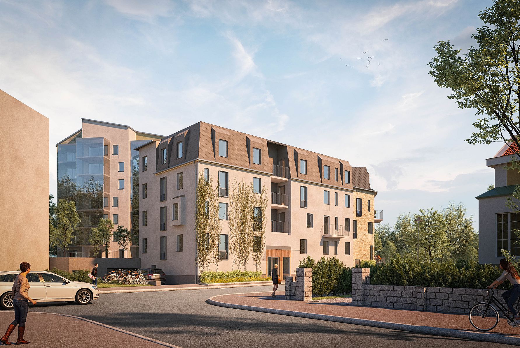Nybyggnad med modern arkitektur omgiven av träd och växtlighet, med personer i förgrunden och en cyklist på en väg