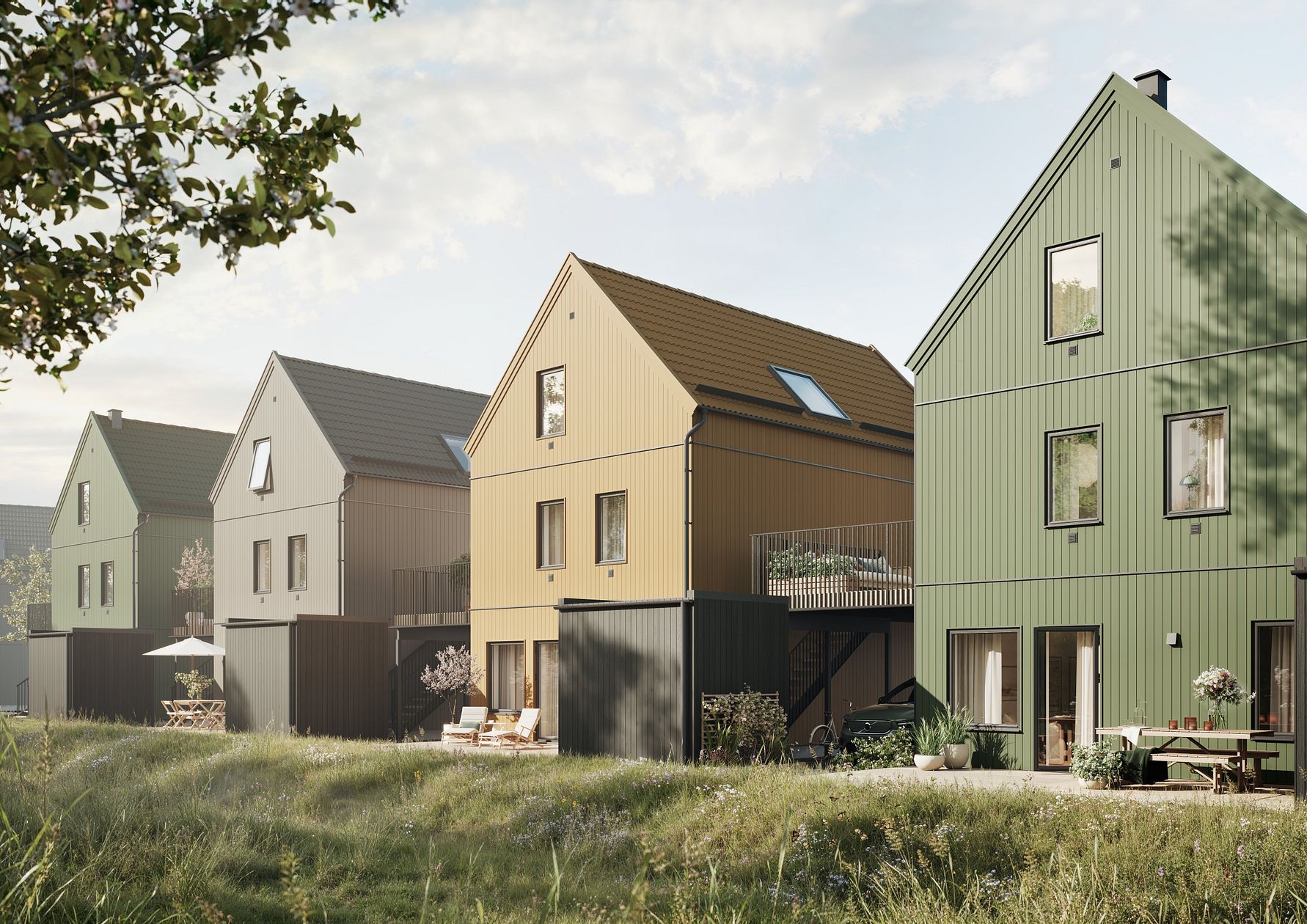 Radhus i en modern arkitektonisk stil med färgglada fasader i grönt, beige, och grått, omgivna av grönska och en gräsplan