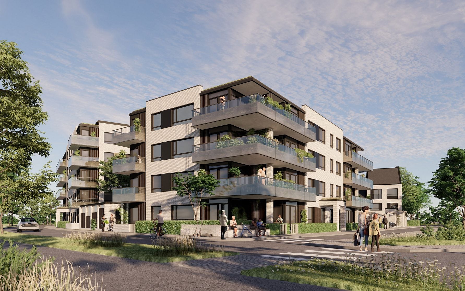 Modernt flerfamiljshus med balkonger, omgiven av grönska, gångvägar och människor i en stadsdel