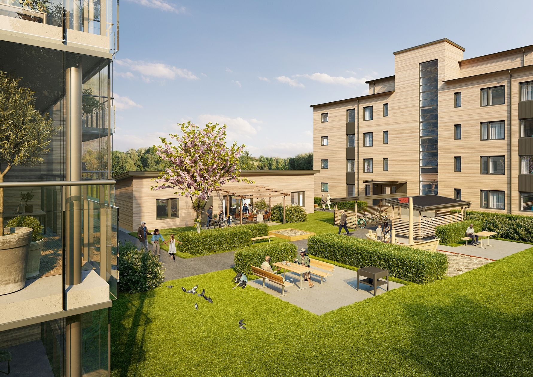 Bostadshus med modern fasad, innergård med grönska, utemöbler, lekplats och människor som socialiserar