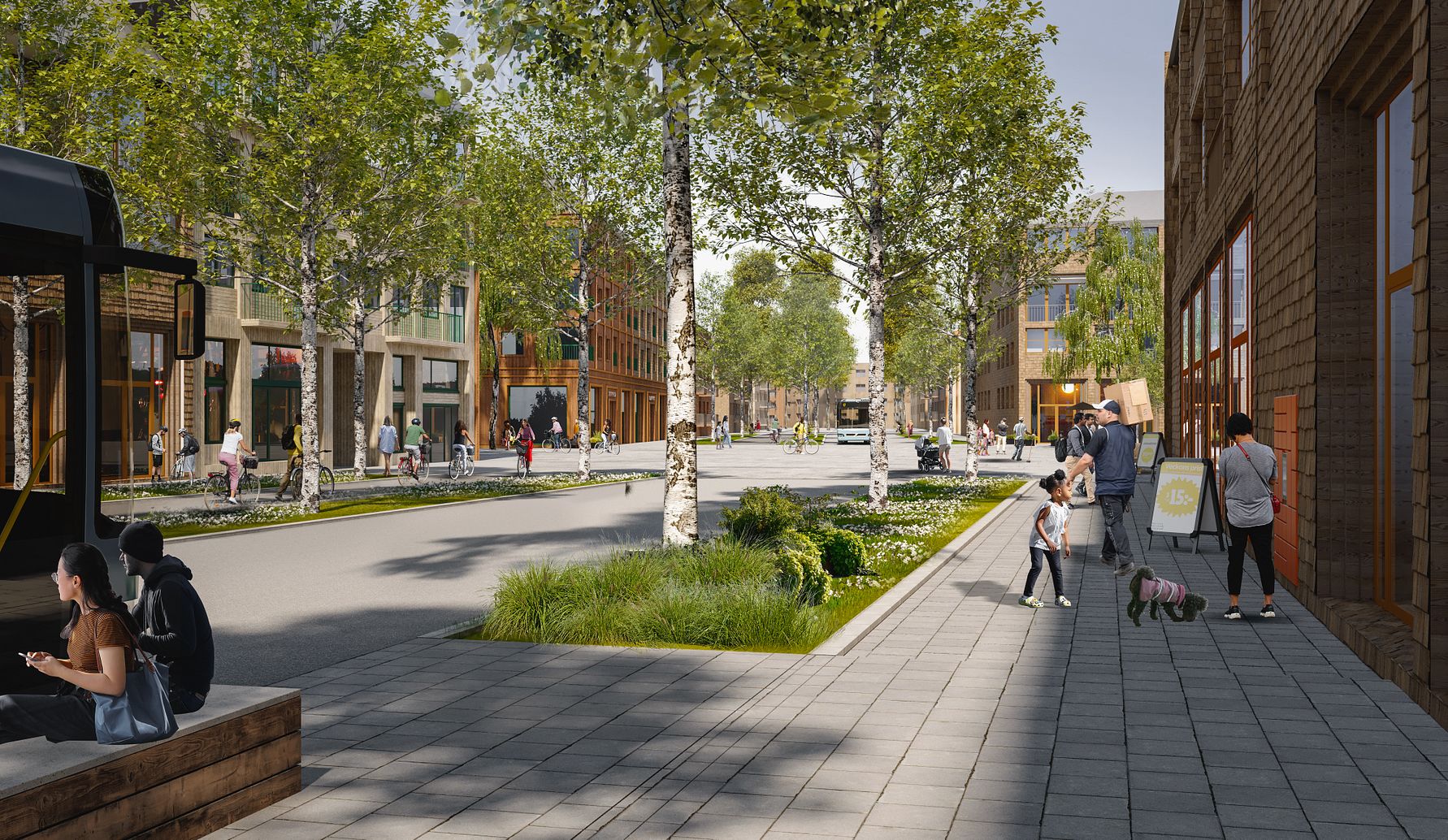 Gata med trottoarer, grönskande träd och människor som promenerar eller sitter. Byggnader i bakgrunden med stadsaktig atmosfär