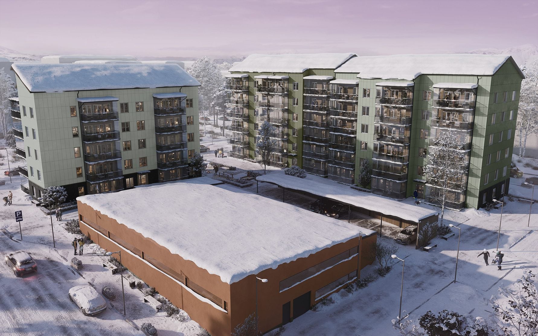 Modern lägenhetsbyggnader med gröna fasader och balkonger, omgivna av snö och vinterlandskap. I förgrunden syns en låg byggnad med platt tak