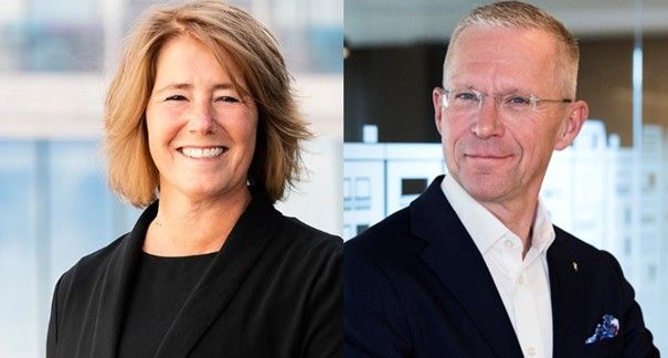 Porträtt av en kvinna i svart klädsel och en man i mörk kostym
