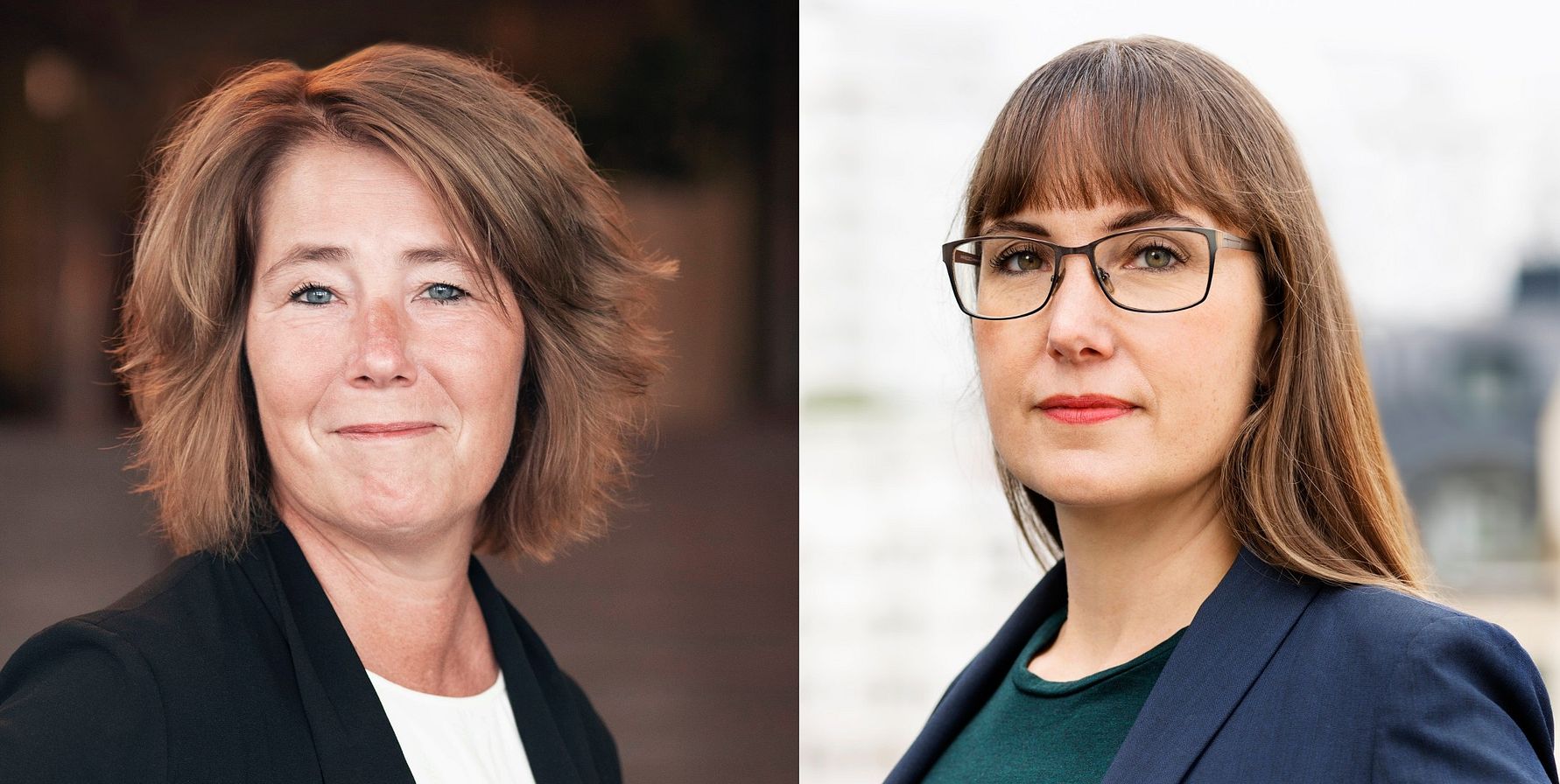 Två kvinnor klädda i professionella kläder, en med axellångt hår och en med långt brunt hår, står utomhus i en stadsmiljö