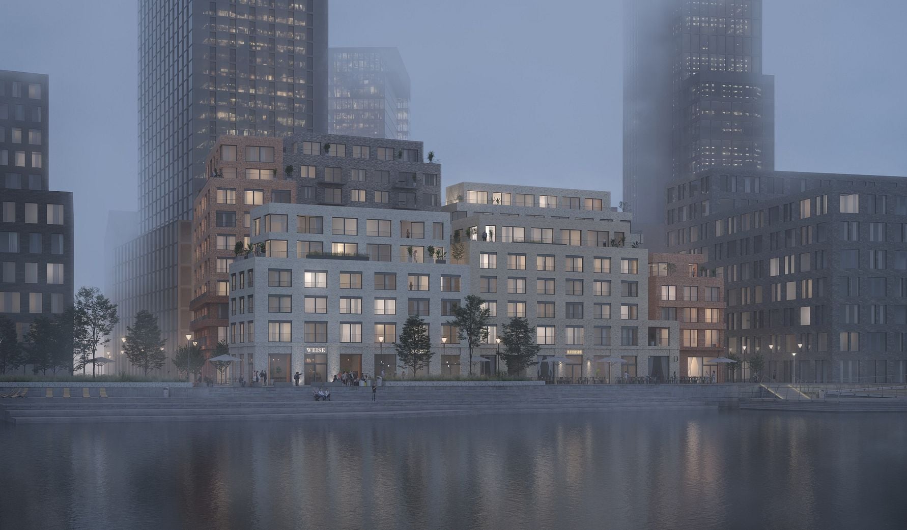 Flervåningsbyggnader vid en vattenkant i dimmigt kvällsljus, med reflektioner synliga i vattnet