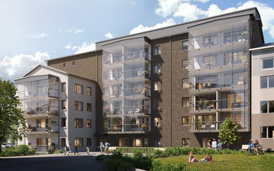 Flerfamiljshus med modern arkitektur, glasbalkonger och omgivande grönska på en solig dag