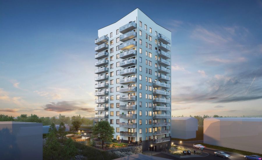 Höghus i modern stil med flera balkonger, omgiven av grönska och upplyst i kvällsmiljö