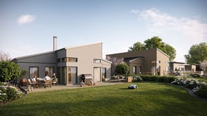 Modern villor med träfasader, stora glaspartier och uteplatser, omgivna av en välskött gräsmatta och blommande träd