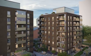 Bruna flerbostadshus med balkonger, omgivna av grönska och utomhusområden