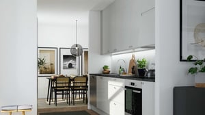 Modernt kök med matplats och ljusa ytskikt