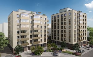 Flerbostadshus med balkonger och innergård