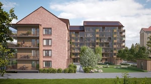 Visualisering av bostadshus med balkonger, grönytor och solpaneler på taket