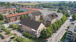 Flygvy över bostadsområde med flera flerfamiljshus och omgivande grönska, med visualisering av nya lägenhetsbyggnader