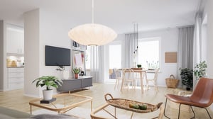 Vardagsrum och matplats i ljusa neutrala färger med stora fönster
