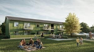 Flerbostadshus med innergård med grönområde