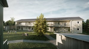 Flerbostadshus med innergård med grönområde