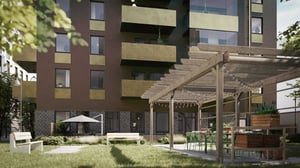 Innergård, pergola, sittplatser och flerbostadshus