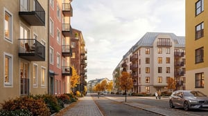 Lägenhet i modernt bostadsområde med flerbostadshus, balkonger och höstträd
