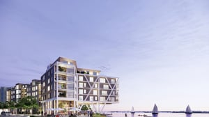 Inflyttningsklar lägenhet i modern bostadsbyggnad med havsutsikt och kvällsljus