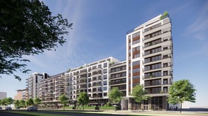 Lägenhet i modern flerbostadshus med balkonger och grönska