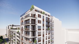 Lägenheter med balkonger i ett modernt flerbostadshus under klar himmel