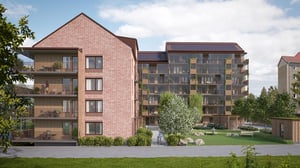 Visualisering av bostadshus med balkonger, grönytor och solpaneler på taket