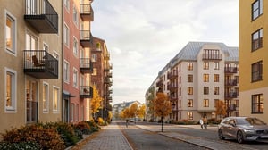 Lägenhet i modernt bostadsområde med flerbostadshus, balkonger och höstträd