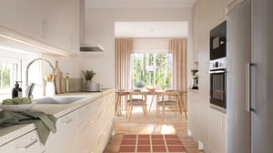 Modernt kök och matplats med ljusa ytskikt, stora fönster och plats för matbord i inflyttningsklar lägenhet