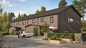Moderna radhus med familj på uppfart och trädgård framför bostäderna