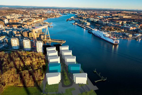 Flygvy över Göteborgs hamn med visualisering av nya bostadskvarter vid vattnet