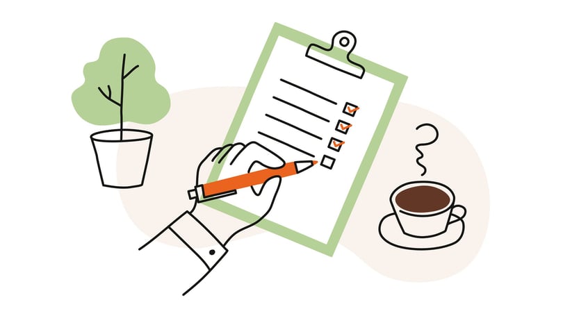 Checklista och en kaffekopp
