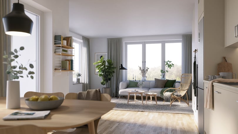 Lägenhet med ljus öppen planlösning, matplats och vardagsrum med soffa, växter och stora fönster