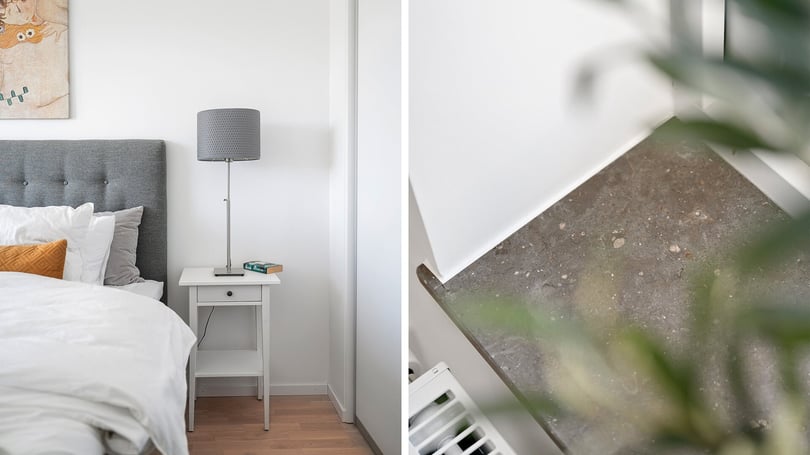 Inflyttningsklar lägenhet med stilren sovrumsmiljö, säng, sängbord och lampa