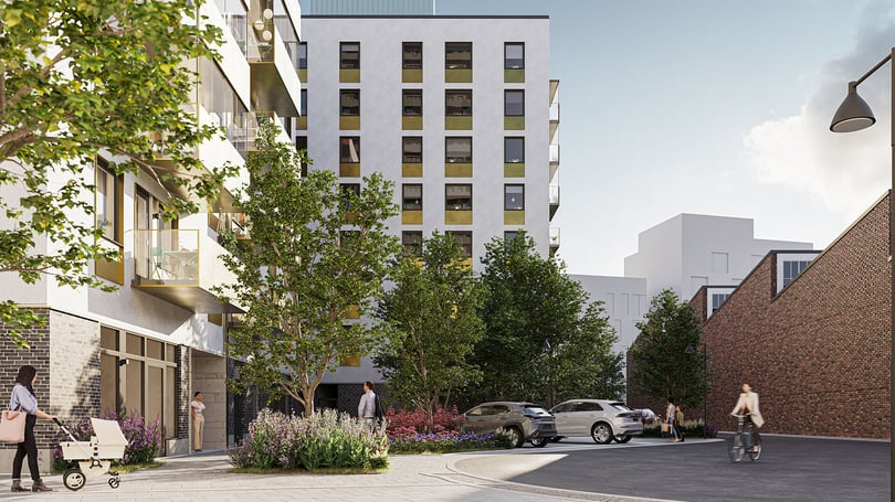 Modernt bostadskvarter med träd, bilar och flera personer utomhus