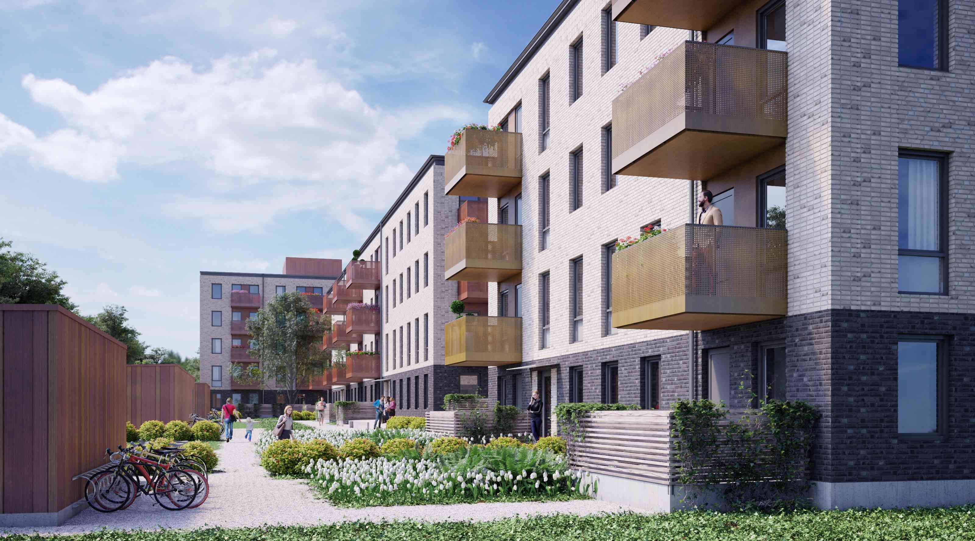 Gården och fasaden på hyreslägenheterna i Pilsnäckan i Limhamn
